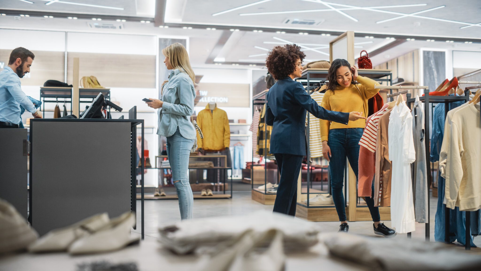 Women shopping for clothes in store